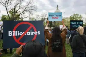 CNN Anchor Reacts to Survey Data on 'Tax the Rich' Policy Impacts